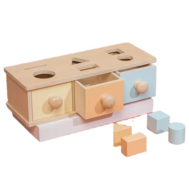 Wooden shape sorting and permanence box